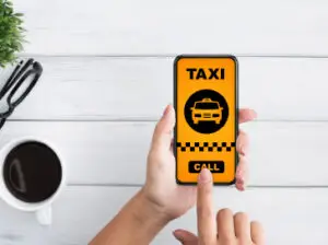 Yellow Cabs GP mobile app interface displayed on a smartphone screen, showcasing booking options and real-time taxi tracking features.